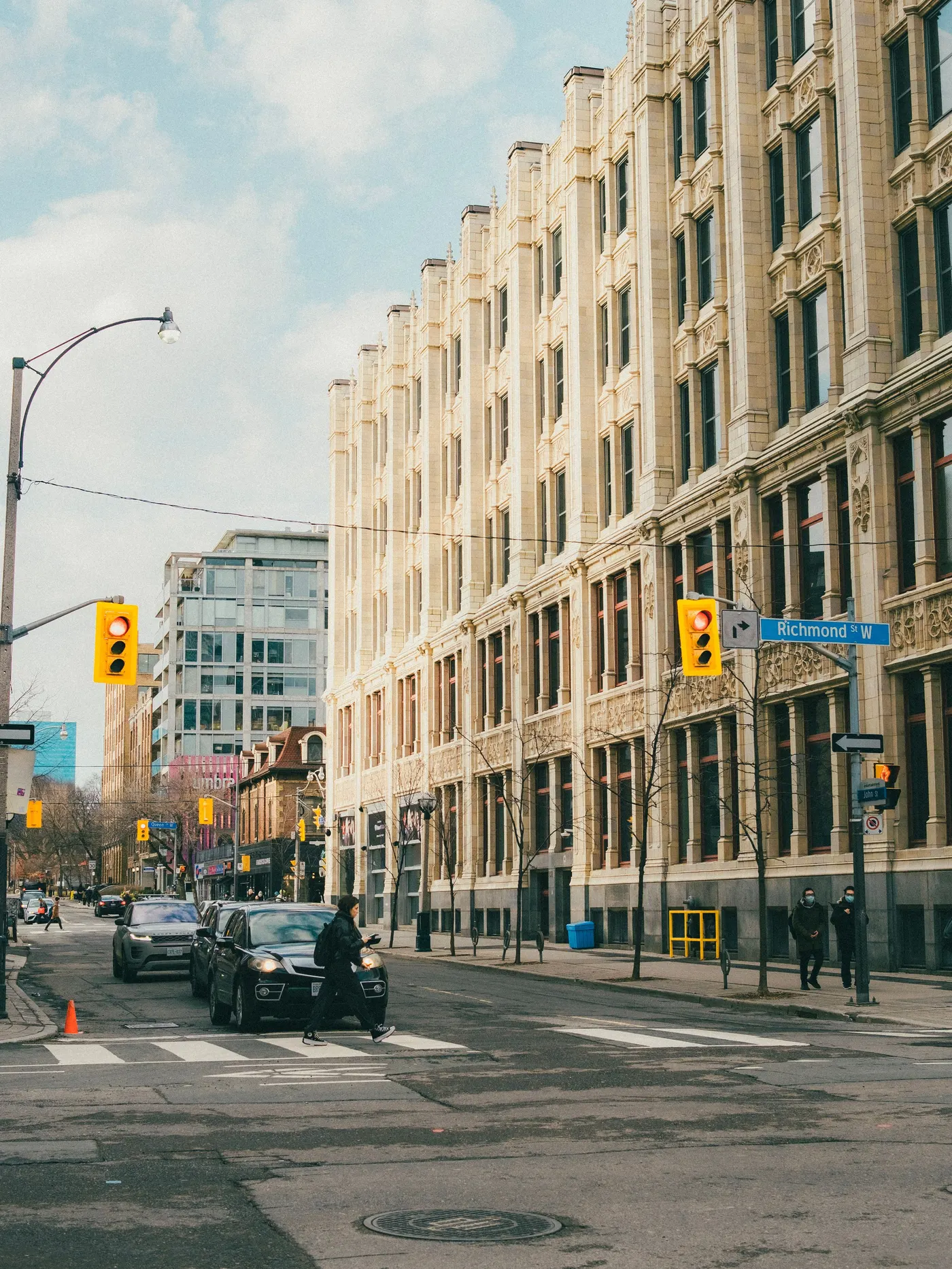 A heritage brick and stone mid-rise block on Richmond Street West in downtown Toronto